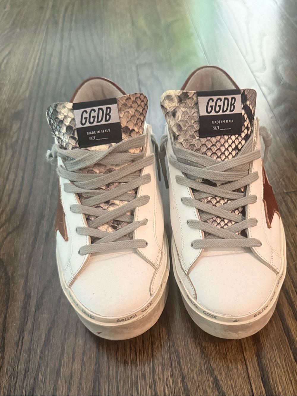 Golden Goose Women’s Platform Sneakers w/Brown Star & Snake-Print Detail.
